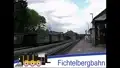 Die Fichtelbergbahn mit Dampflok bei der Einfahrt in den Oberwiesenthaler Bahnhof